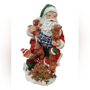 Festive Santa Claus Statue with Bears